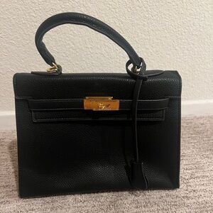 Black purse with clasp